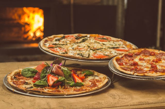 Pizza Ovens and Bird Feeders: Flavor and Wildlife in the Garden